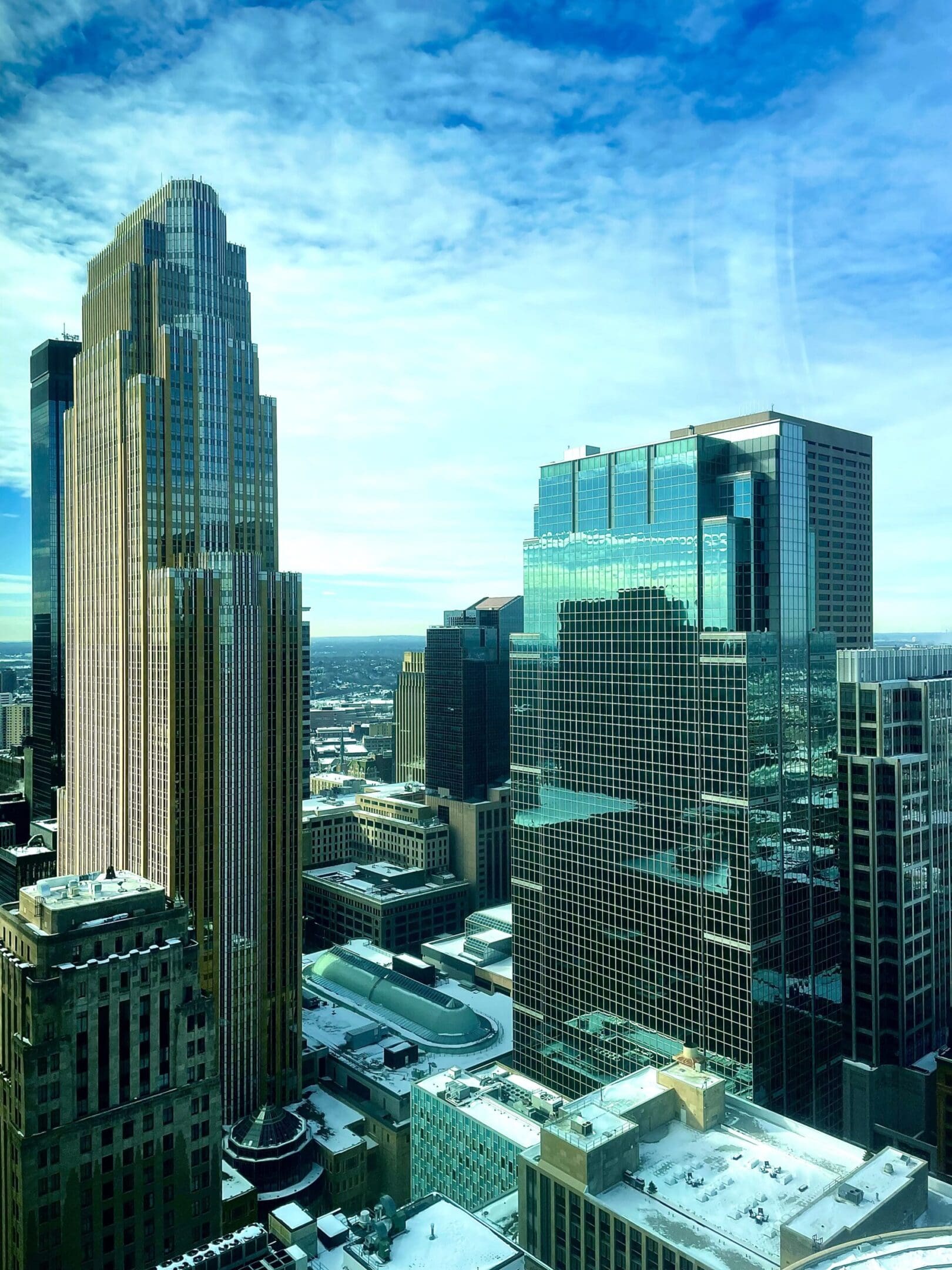 Modern skyscrapers under a blue sky